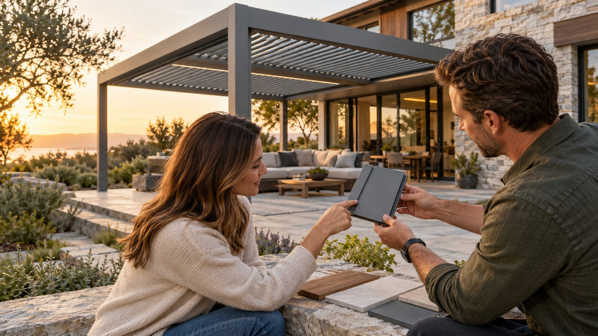 Homeowner and designer comparing a gray pergola frame sample with a finished motorized pergola